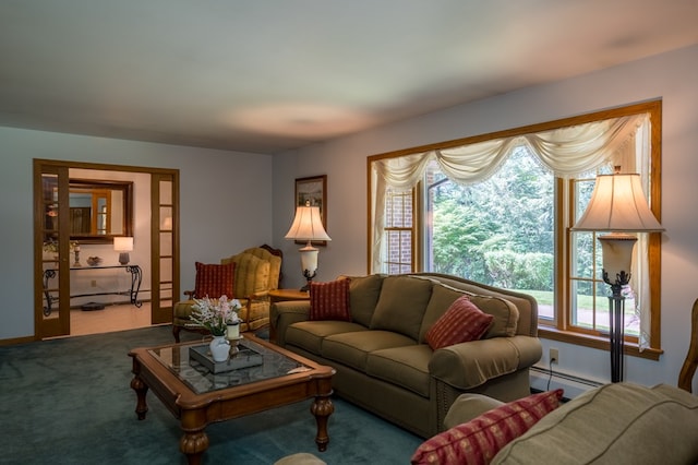 105 Laurel Ln, Sayre, PA 18840 - living area featuring healthy amount of natural light, baseboard heating, and carpet floors