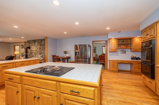 105 Laurel Ln, Sayre, PA 18840 - kitchen with black appliances, tile countertops, light wood finished floors, and recessed lighting