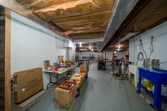 105 Laurel Ln, Sayre, PA 18840 - unfinished below grade area featuring a workshop area