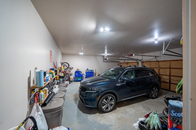 105 Laurel Ln, Sayre, PA 18840 - garage featuring a garage door opener