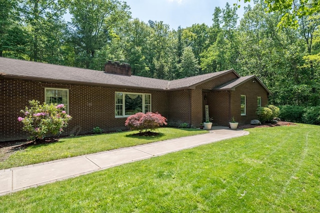 105 Laurel Ln, Sayre, PA 18840 - single story home with a chimney, brick siding, and a front yard