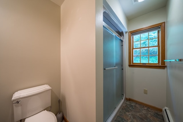 105 Laurel Ln, Sayre, PA 18840 - bathroom featuring baseboard heating, baseboards, toilet, a shower stall, and stone finish floors