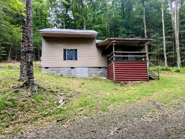 198 Spring Run Rd, Smethport, PA 16749 - view of front of property with crawl space, stairs, a view of trees, and a front yard