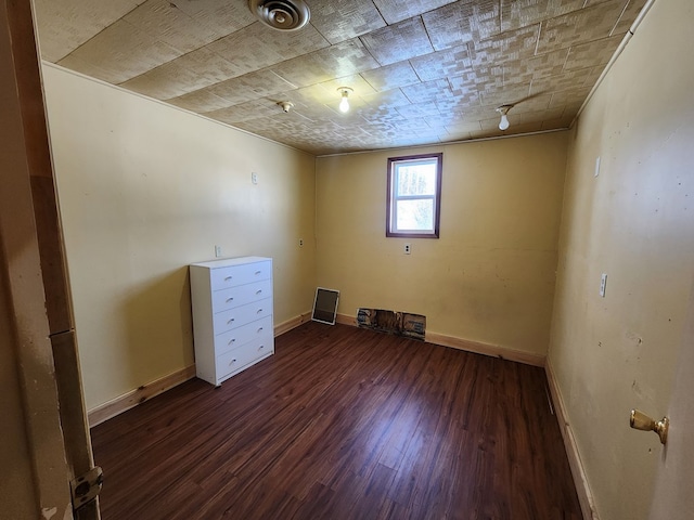 504 S E St, Coudersport, PA 16915 - unfurnished bedroom featuring dark wood-style flooring and baseboards