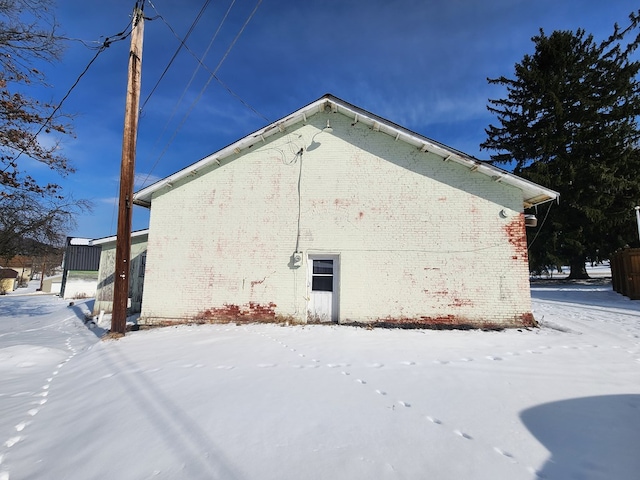 view of snow covered property