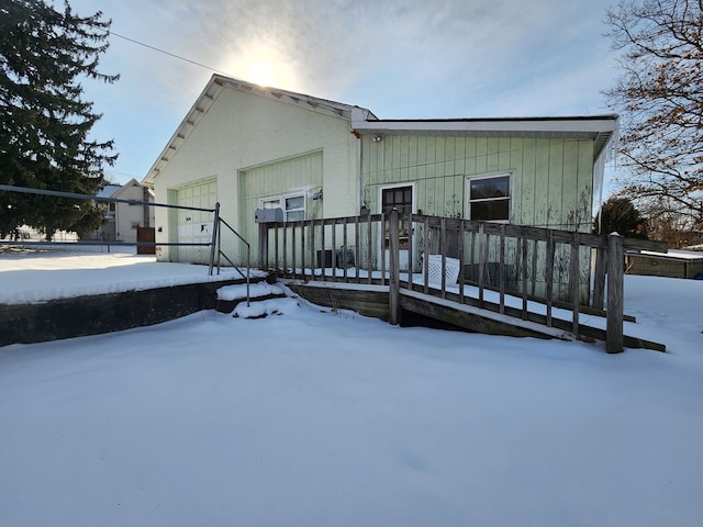 view of snow covered house