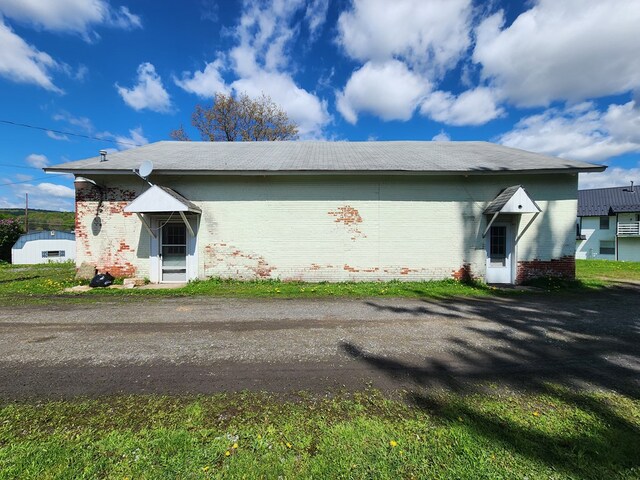 504 S E St, Coudersport, PA 16915 - view of side of property featuring brick siding