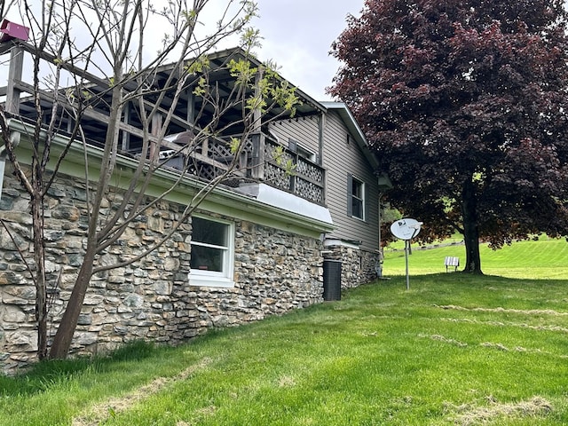 3092 Rte 155, Port Allegany, PA 16743 - view of property exterior featuring stone siding, a yard, and a balcony
