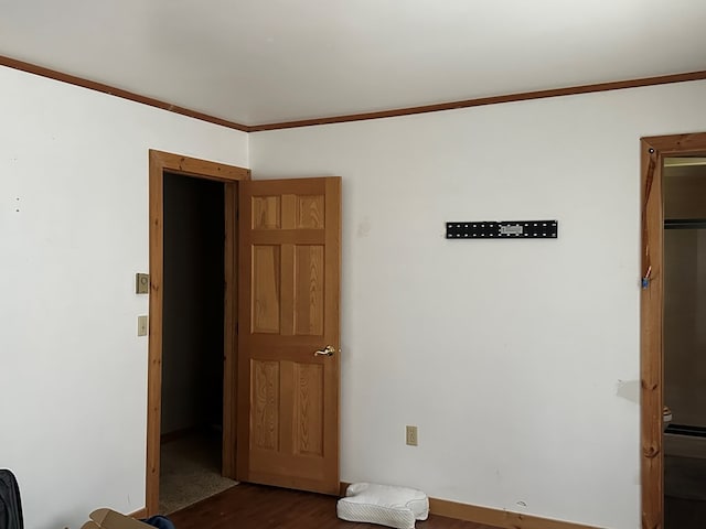 3092 Rte 155, Port Allegany, PA 16743 - unfurnished bedroom with dark wood-type flooring and crown molding