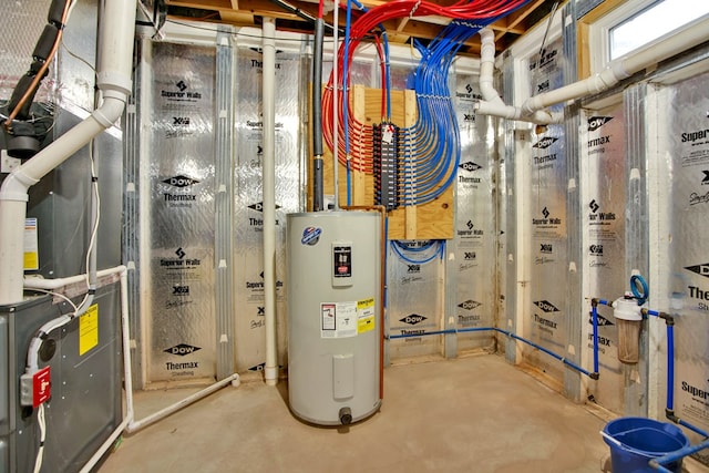 utility room with electric water heater