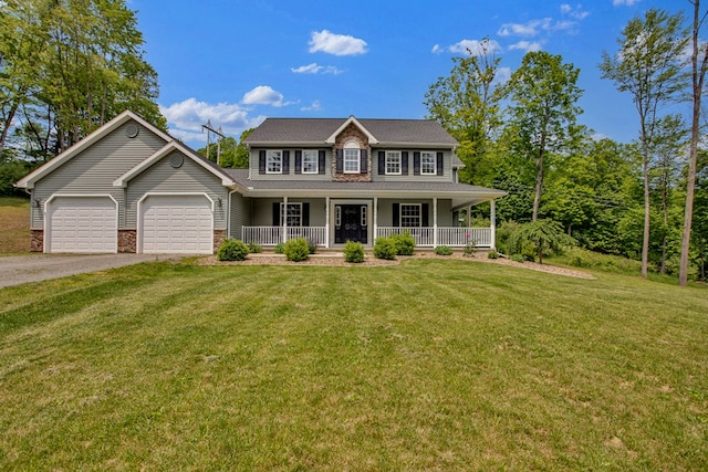5 Sylvan Glen Rd, Wellsboro, PA 16901 - colonial-style house with covered porch, an attached garage, asphalt driveway, a front lawn, and roof with shingles