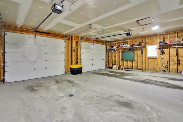 garage featuring a garage door opener