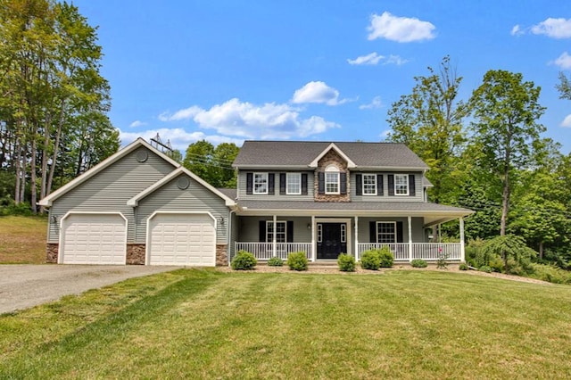 5 Sylvan Glen Rd, Wellsboro, PA 16901 - colonial-style house with asphalt driveway, covered porch, a garage, and a front yard