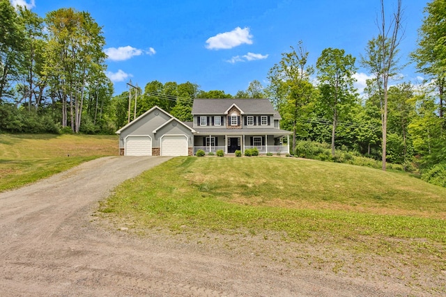 5 Sylvan Glen Rd, Wellsboro, PA 16901 - colonial-style house featuring a porch, asphalt driveway, and a front lawn