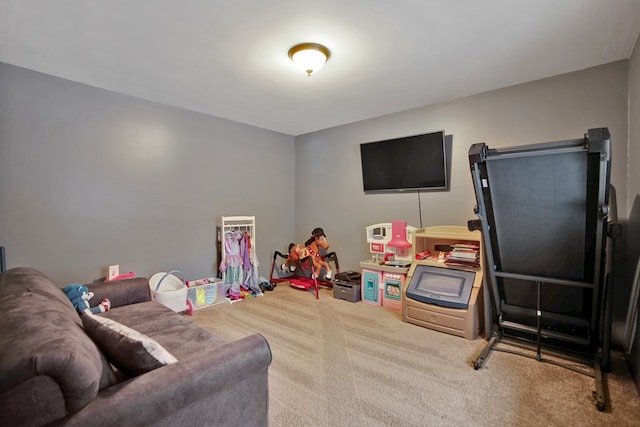 recreation room featuring light colored carpet