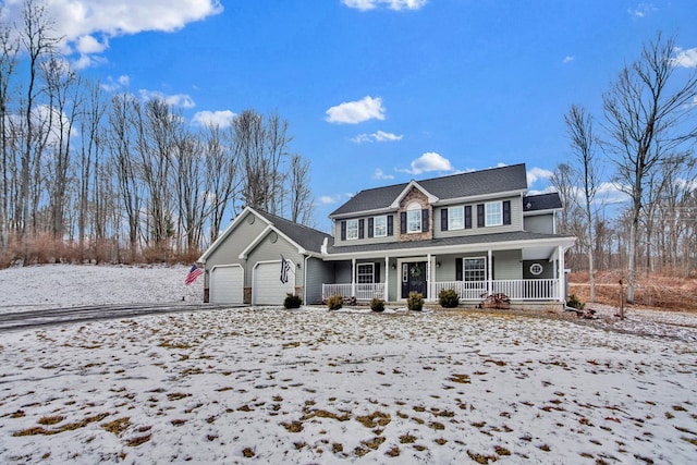 view of front of house with a porch and a garage