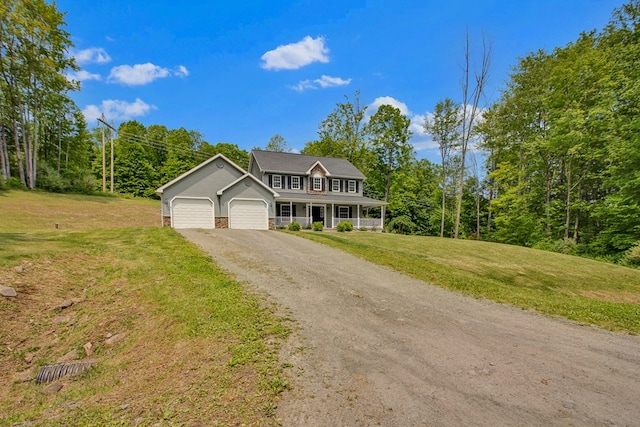 5 Sylvan Glen Rd, Wellsboro, PA 16901 - view of front of home with a garage, a front yard, dirt driveway, and covered porch