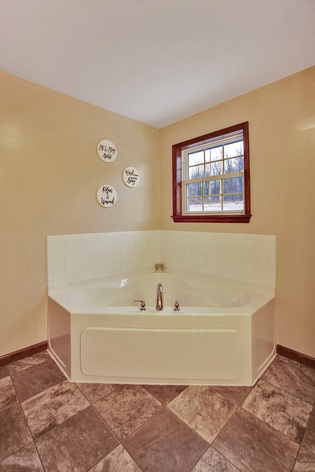 bathroom with a washtub