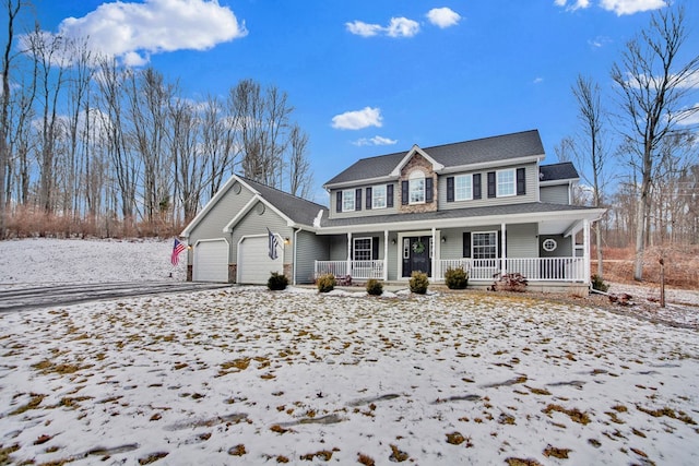 view of front of property featuring a porch and a garage