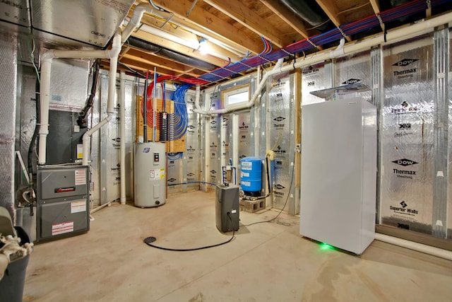 basement featuring electric water heater and heating unit