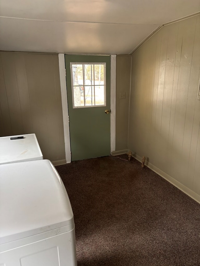 laundry area featuring laundry area, carpet, and wooden walls