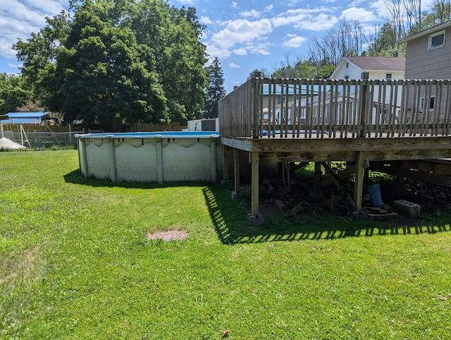 view of yard featuring a swimming pool side deck