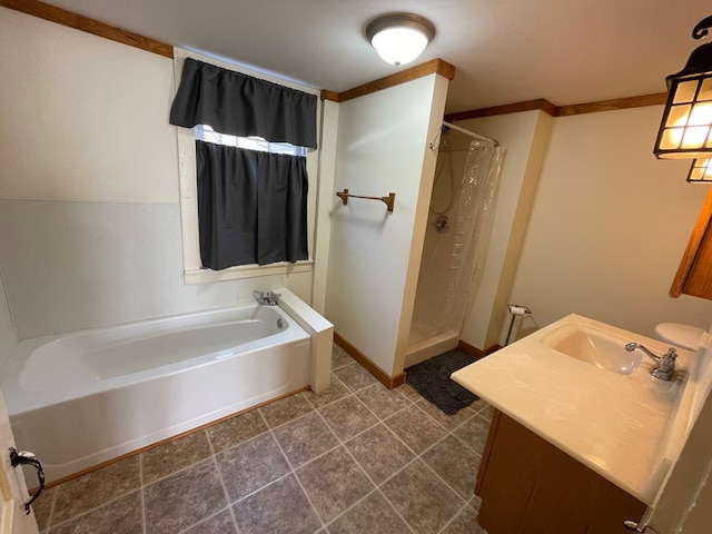 bathroom featuring separate shower and tub, crown molding, and vanity