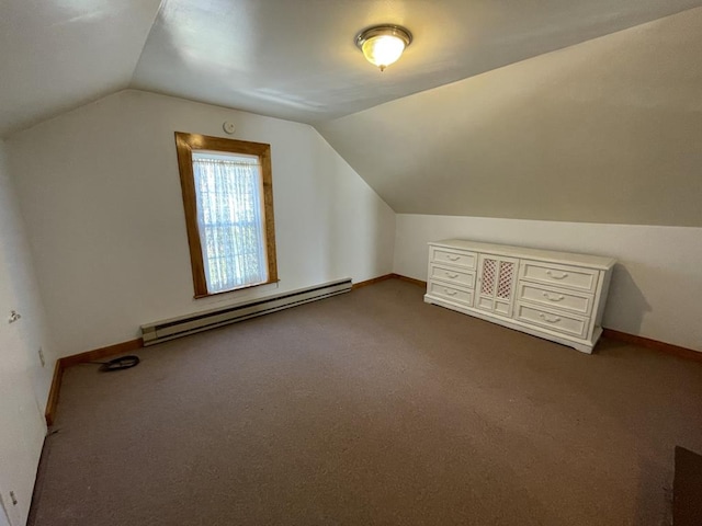 additional living space featuring lofted ceiling, a baseboard radiator, and carpet