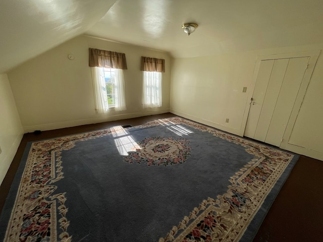 bonus room featuring vaulted ceiling