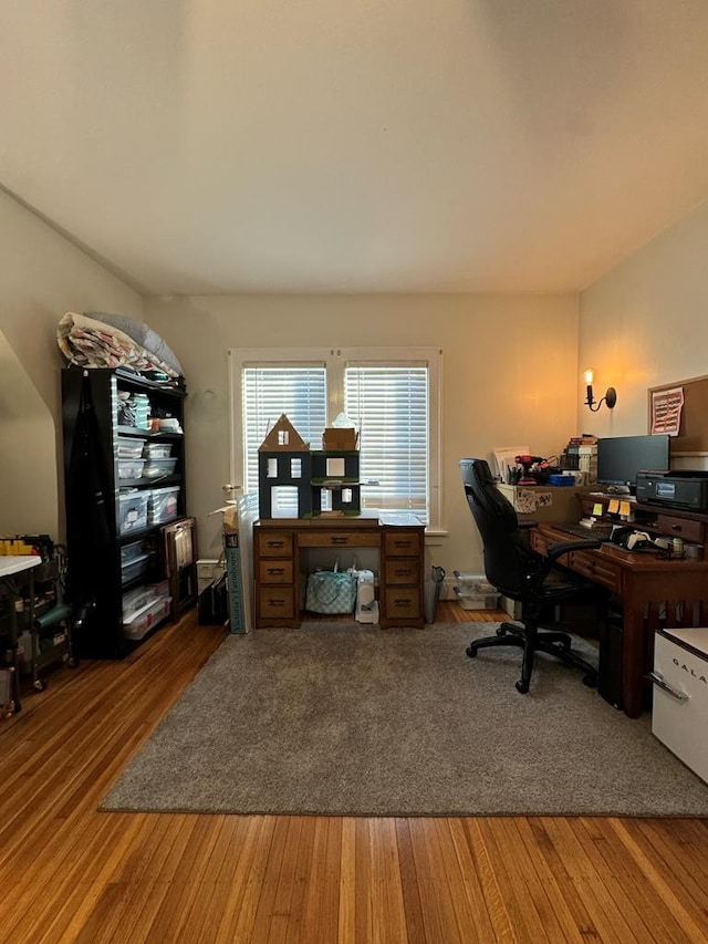 office space with wood finished floors