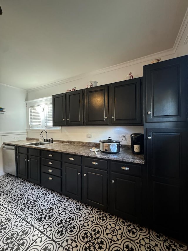 bar with ornamental molding, a sink, dishwasher, and light tile patterned floors