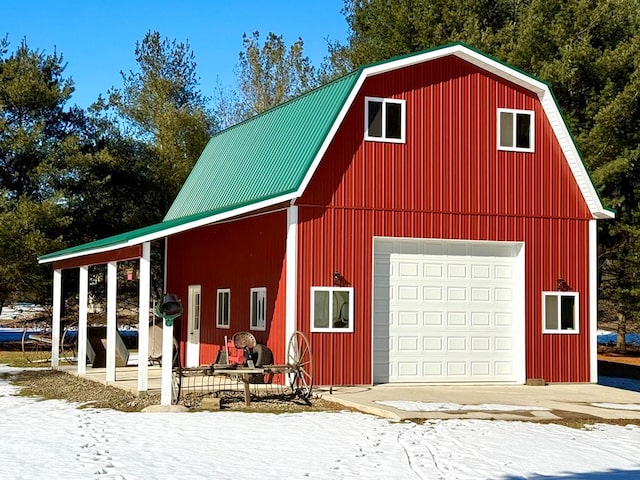 view of snow covered garage