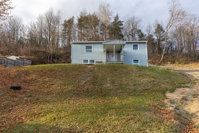 view of front of home featuring a front lawn and a porch