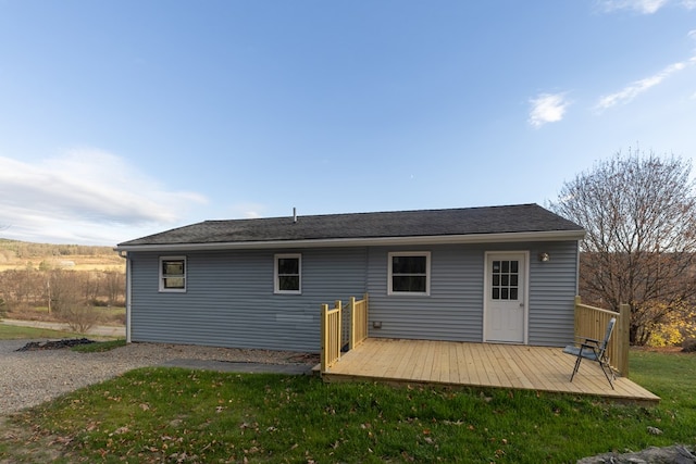 303 E Sullivanville Rd, Horseheads, NY 14845 - back of property with a lawn and a wooden deck
