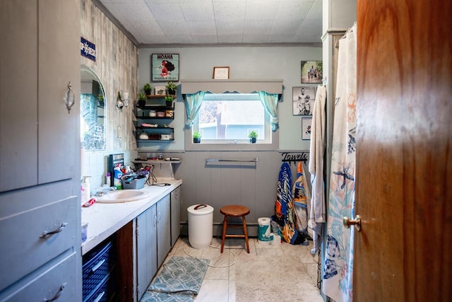 64 Extension St, Mansfield, PA 16933 - kitchen with a sink, light countertops, baseboard heating, and light tile patterned floors