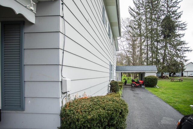 64 Extension St, Mansfield, PA 16933 - view of home's exterior featuring a lawn