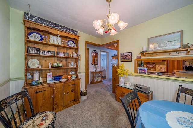 517 Mohawk St, Sayre, PA 18640 - carpeted dining area featuring a chandelier