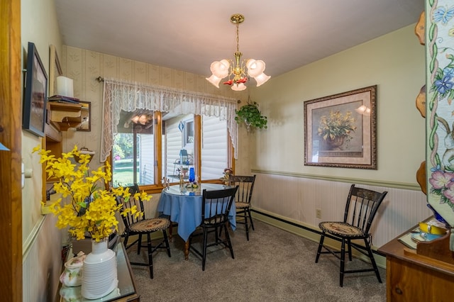517 Mohawk St, Sayre, PA 18640 - dining room with a chandelier, carpet floors, and wainscoting