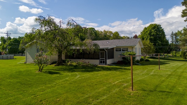 517 Mohawk St, Sayre, PA 18640 - view of green lawn featuring a sunroom