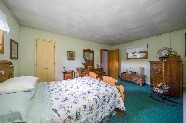 517 Mohawk St, Sayre, PA 18640 - carpeted bedroom with a baseboard radiator