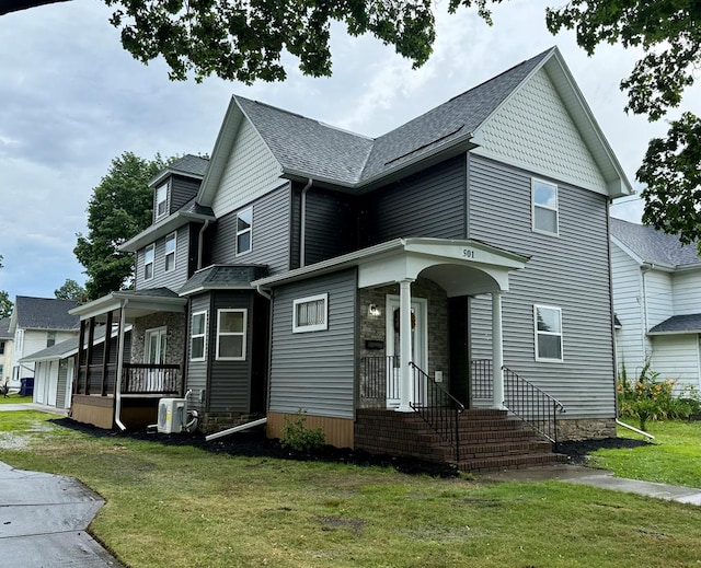 501 N Main St, Athens, PA 18810 - view of side of property featuring a lawn, roof with shingles, and stone siding