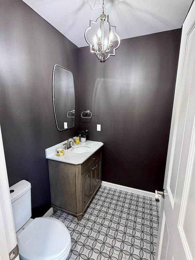 501 N Main St, Athens, PA 18810 - half bath featuring vanity and a chandelier
