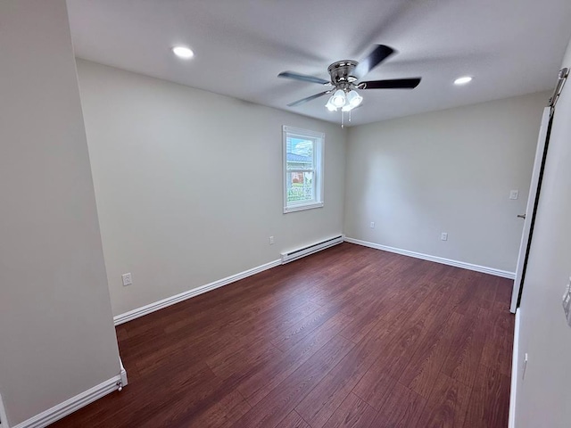 501 N Main St, Athens, PA 18810 - spare room with baseboard heating, dark wood-style floors, ceiling fan, and recessed lighting