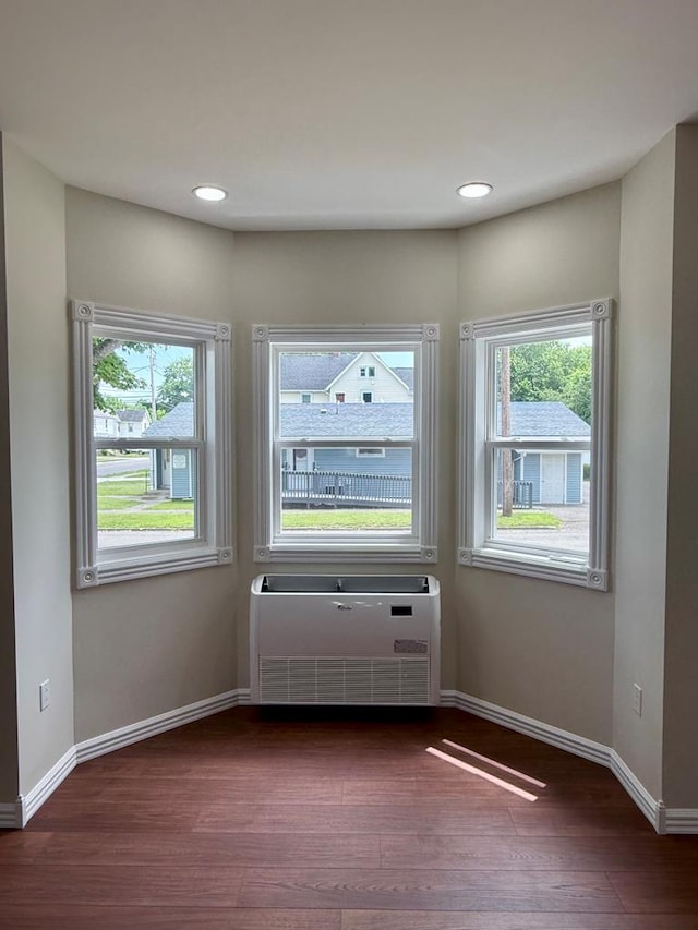 501 N Main St, Athens, PA 18810 - empty room featuring wood finished floors, recessed lighting, and radiator