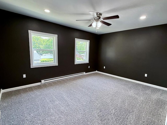 501 N Main St, Athens, PA 18810 - carpeted empty room with a baseboard heating unit, a ceiling fan, and recessed lighting