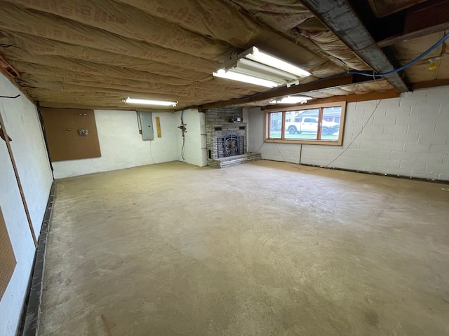 401 Center St, Ulysses, PA 16948 - below grade area featuring electric panel and a fireplace