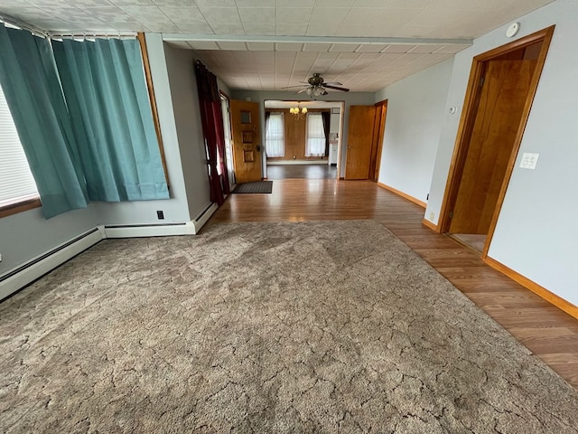 401 Center St, Ulysses, PA 16948 - empty room featuring wood finished floors, a smoke detector, and a ceiling fan
