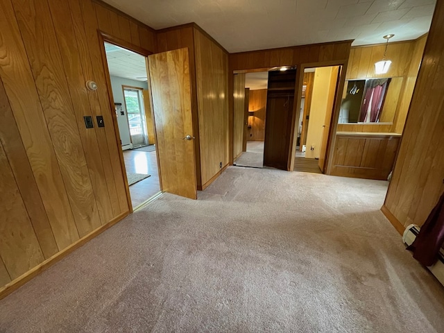 401 Center St, Ulysses, PA 16948 - unfurnished bedroom featuring wooden walls, carpet floors, a closet, and ensuite bath