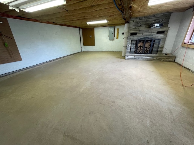 401 Center St, Ulysses, PA 16948 - finished below grade area featuring electric panel and a stone fireplace