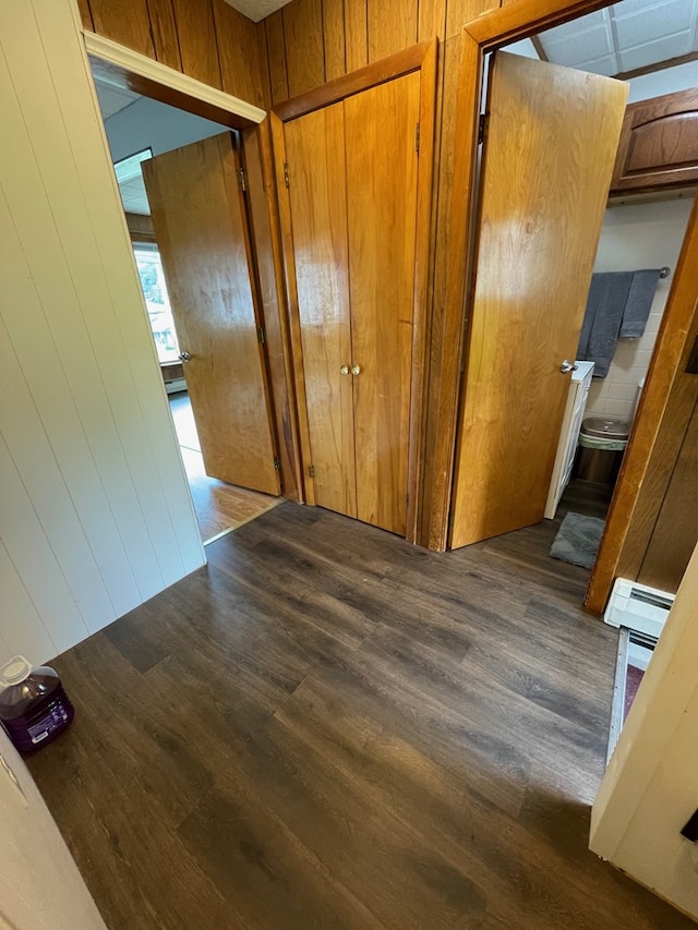 401 Center St, Ulysses, PA 16948 - corridor with wood finished floors, baseboard heating, and wood walls